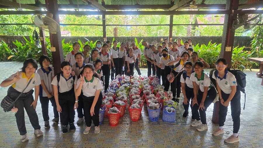 Students came together to pack essential food items for the local villagers in Cambodia